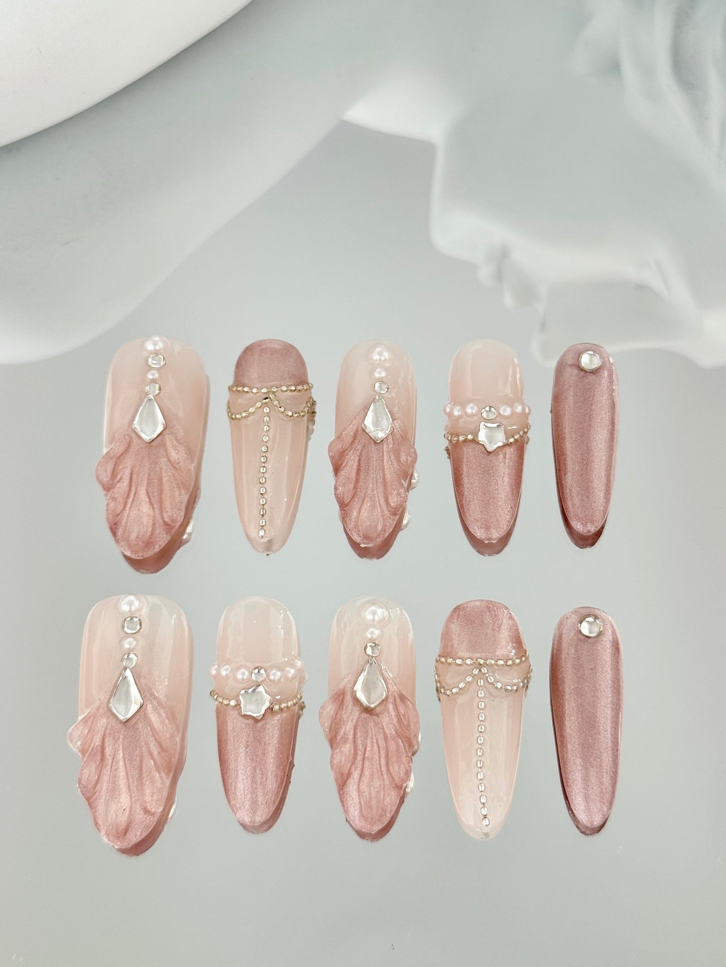 Long oval shell shaped nails pink