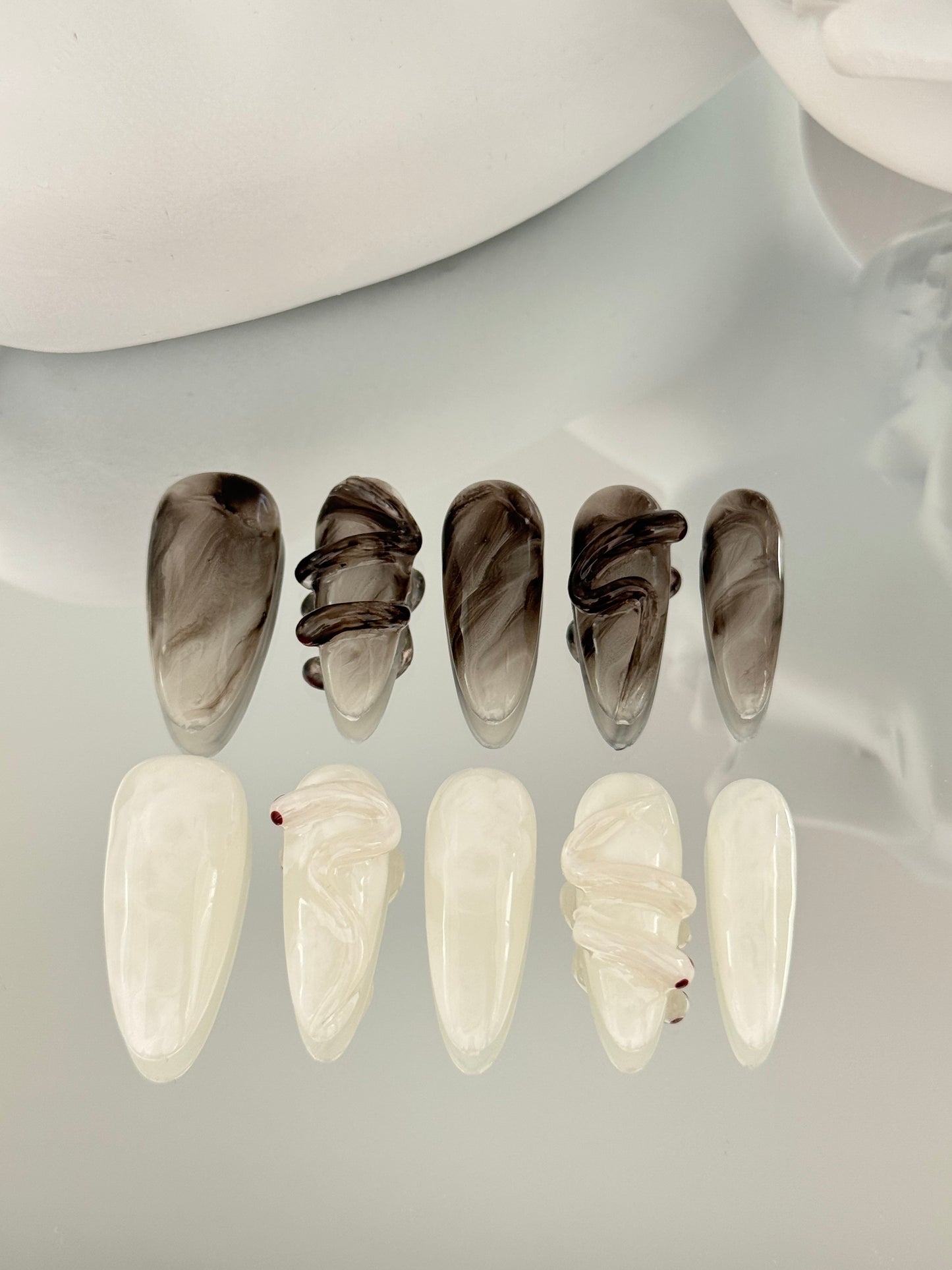Superlong almond hand-painted snake nails black white