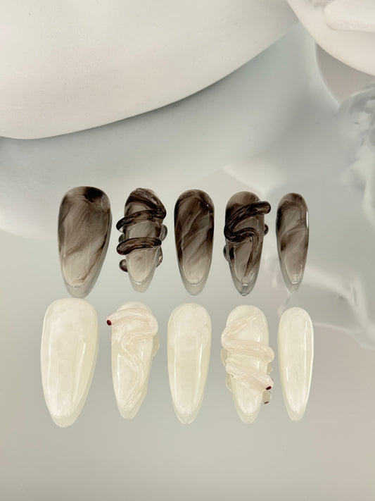 Superlong almond hand-painted snake nails black white