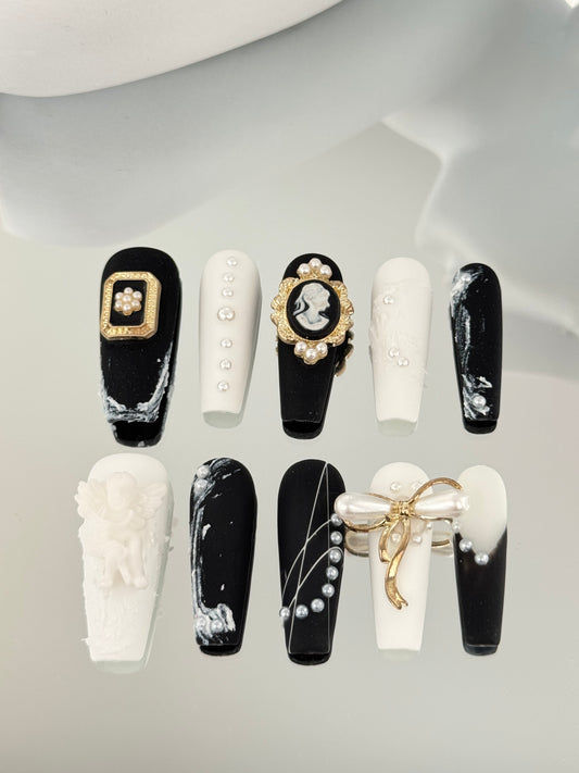 Long coffin matte nails black white