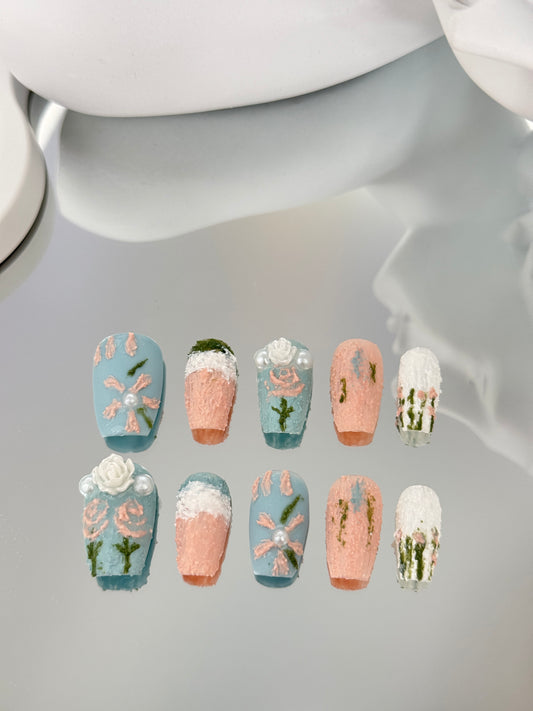 Medium length coffin hand painted matte nails blue pink