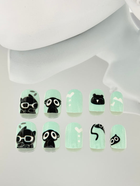 Short square oval black cat nails green