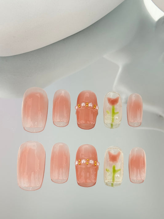 Medium length square oval hand painted tulip nails pink