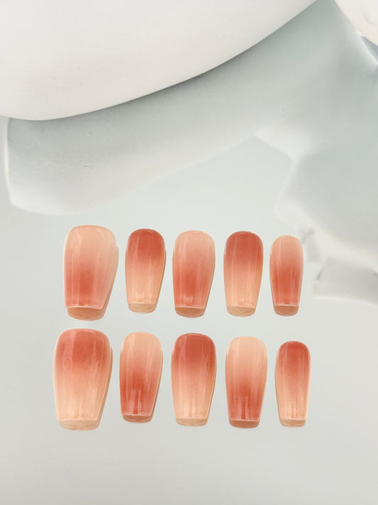 Medium length coffin gradient nails pink