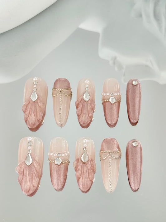 Long oval shell shaped nails pink