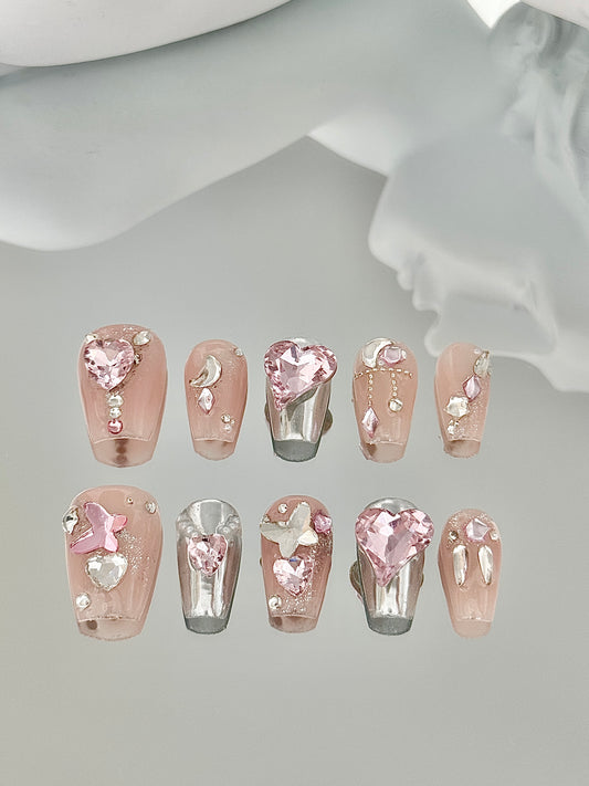 Medium length coffin diamond nails pink silvery
