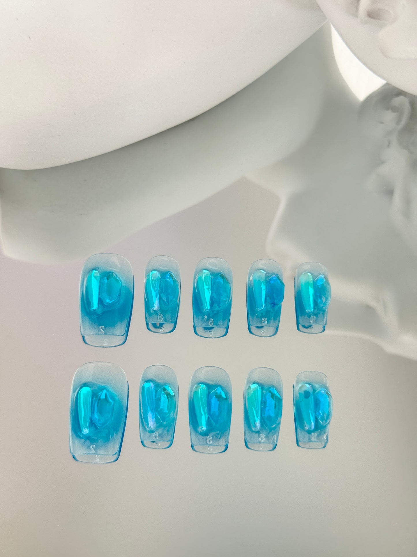 Medium length square diamond nails blue