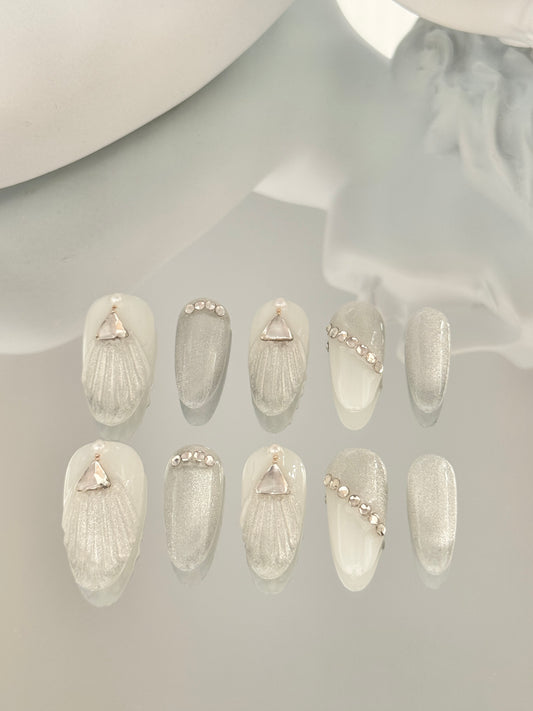 Long oval shell shaped nails silver