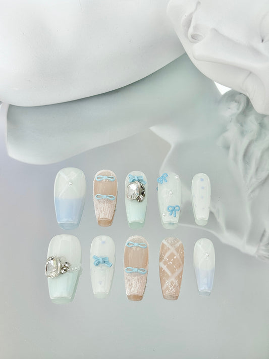 Long coffin coquette nails blue